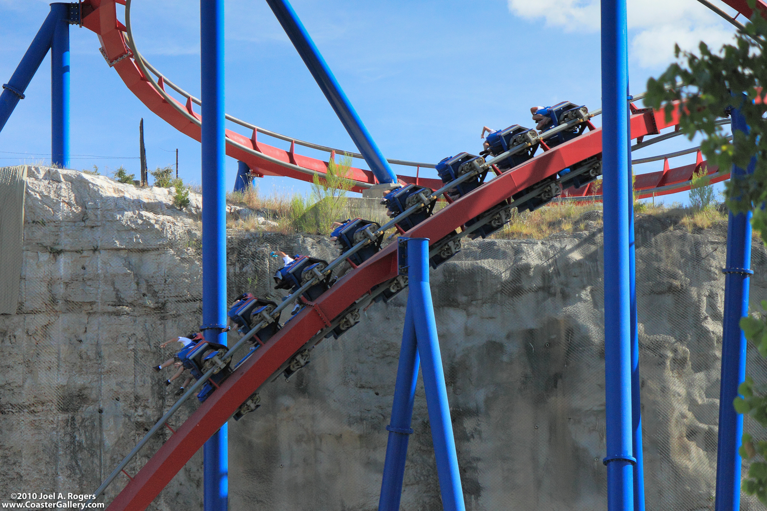 A roller coaster going over a cliff