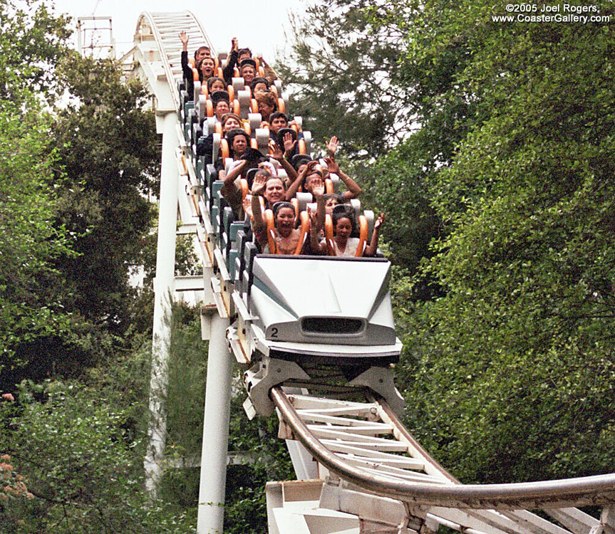 Six Flags Magic Mountain's New Revolution roller coaster. Shoulder-harness versus lap bar restraints.