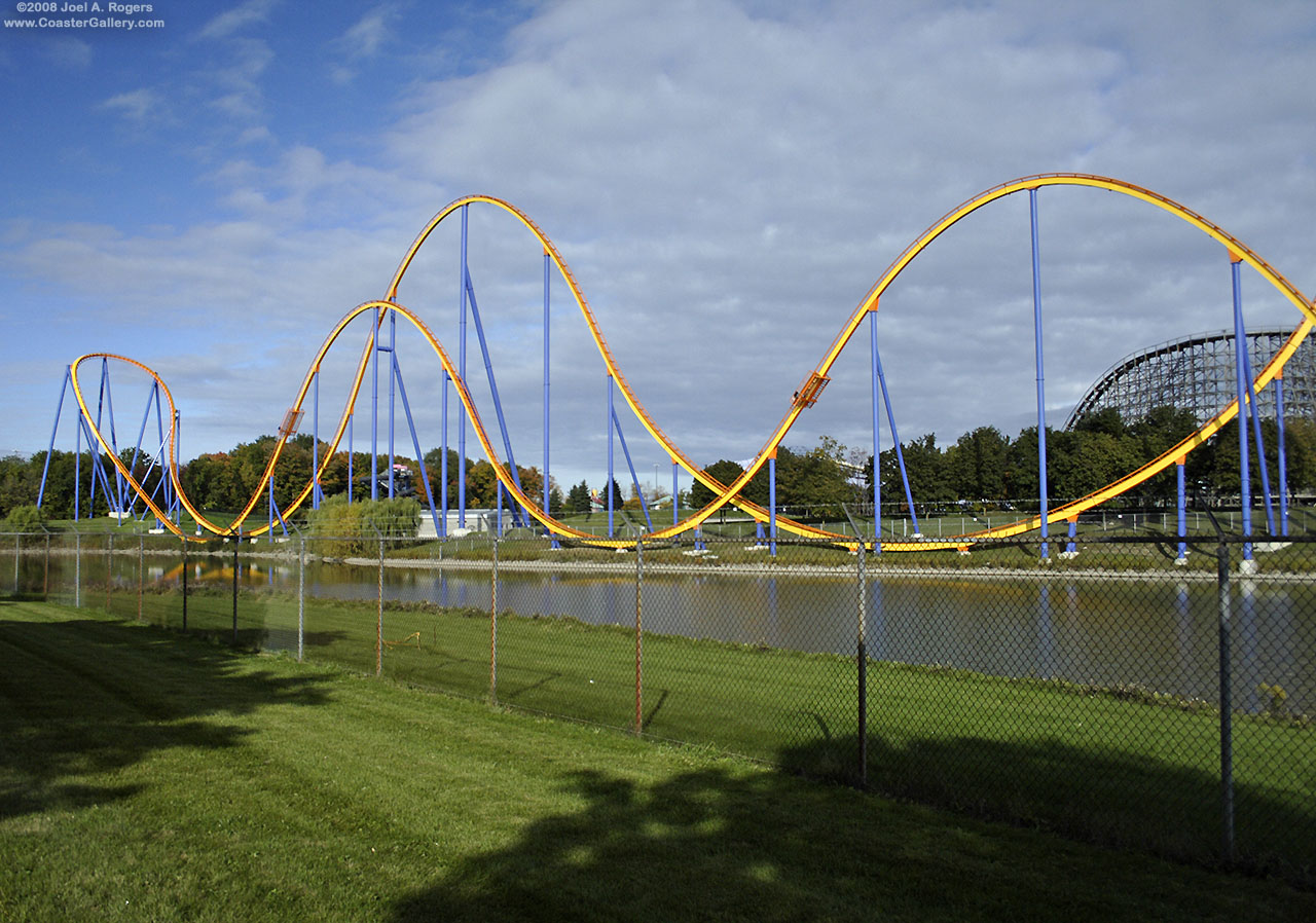 A roller coaster and a lake