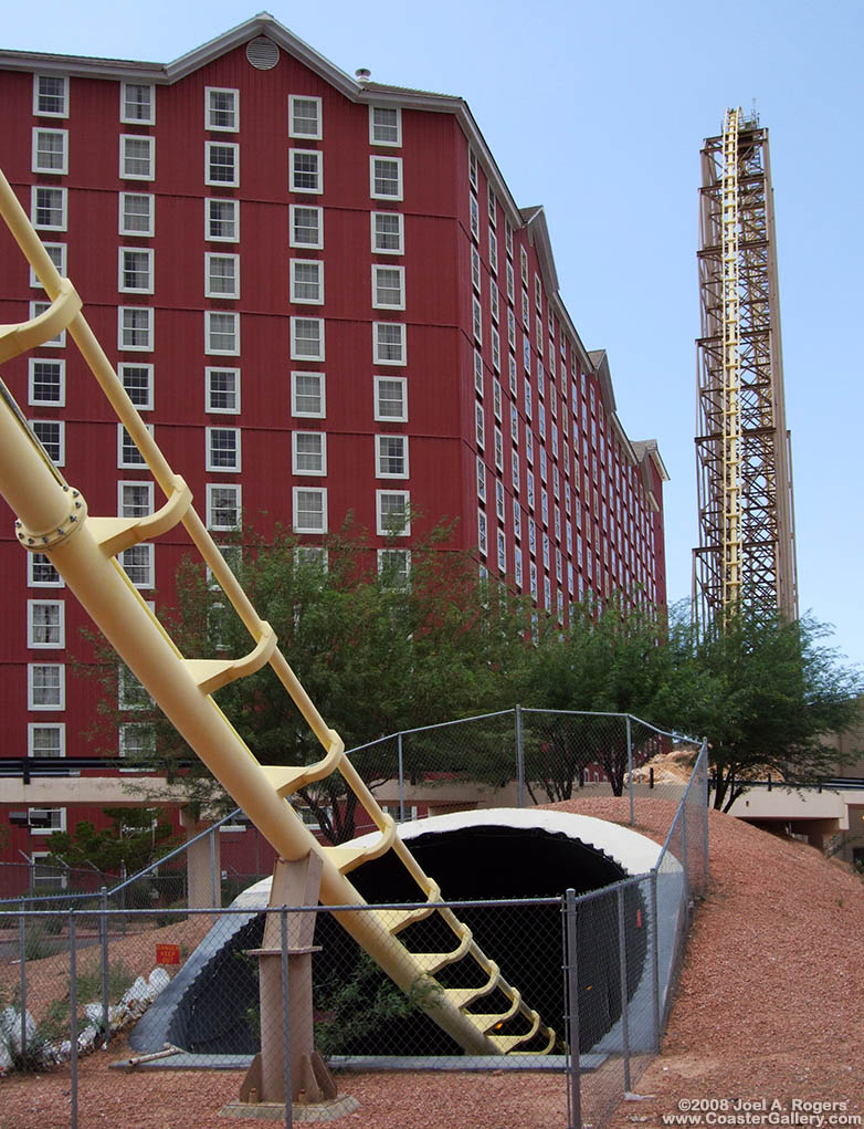 Hotel, roller coaster, and tunnel