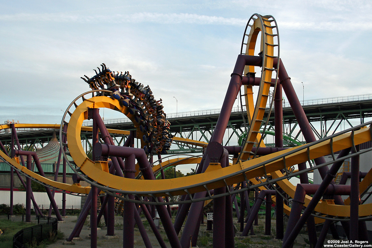 A trainfull of riders flipped up-side-down