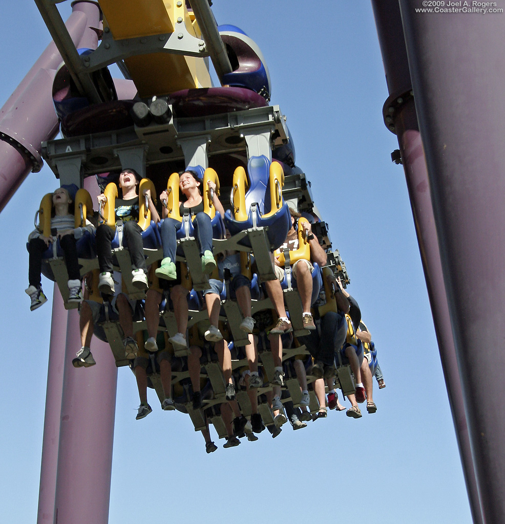 Close-up view of a roller coaster hanging under the track
