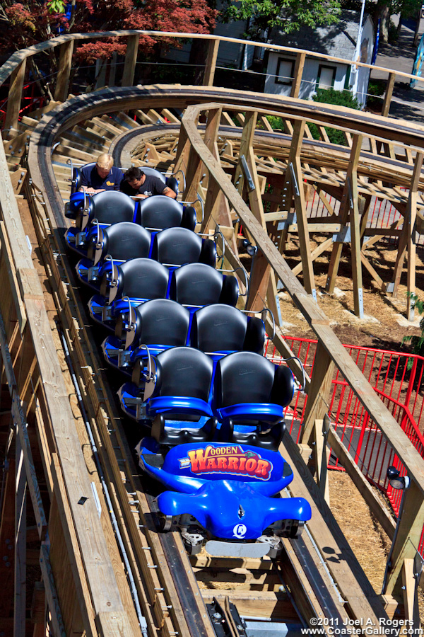 Testing a wooden coaster ride at an amusement park