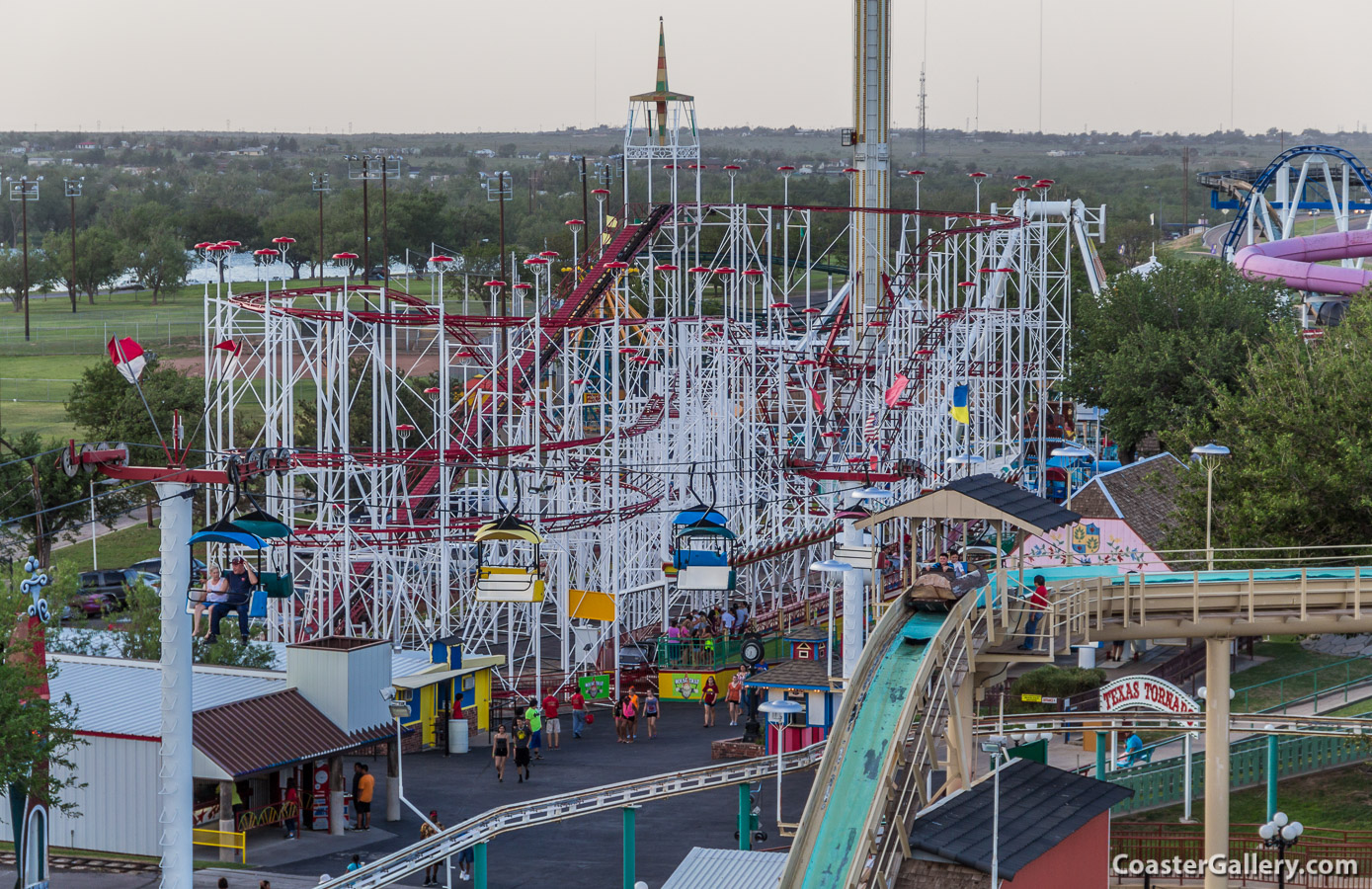 Aerial view of the Mouse Trap Coaster and green Hornet at Wonderland Amusement Park