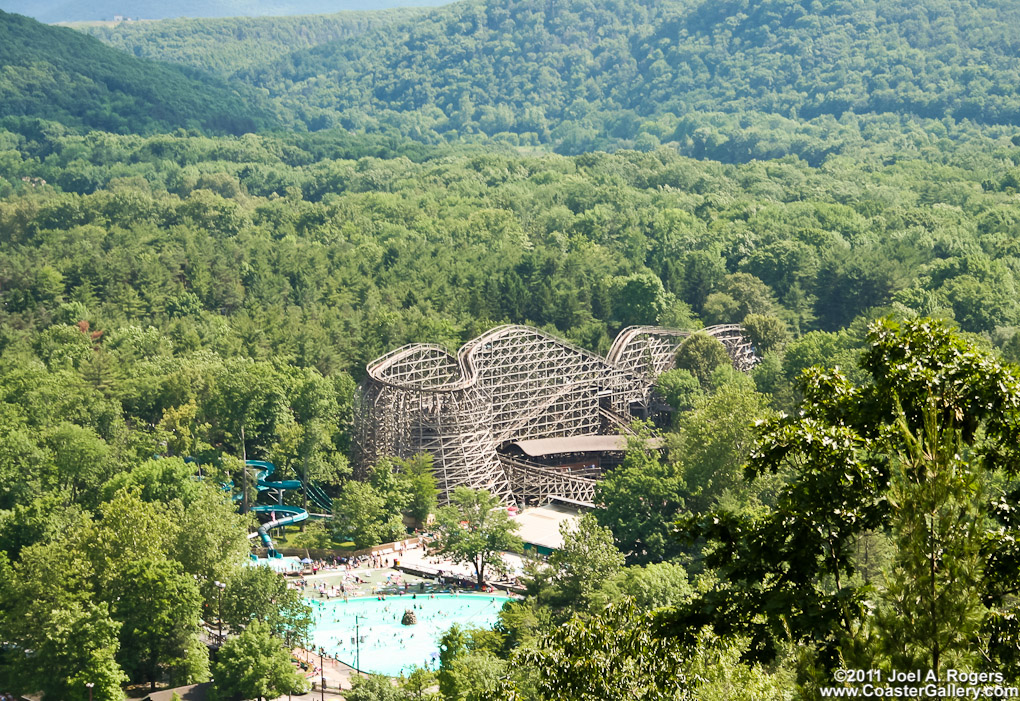 Aerial view of the Twister roller coaster and Knoebels Amusement Park situated in the 
	Pennsylvania woods