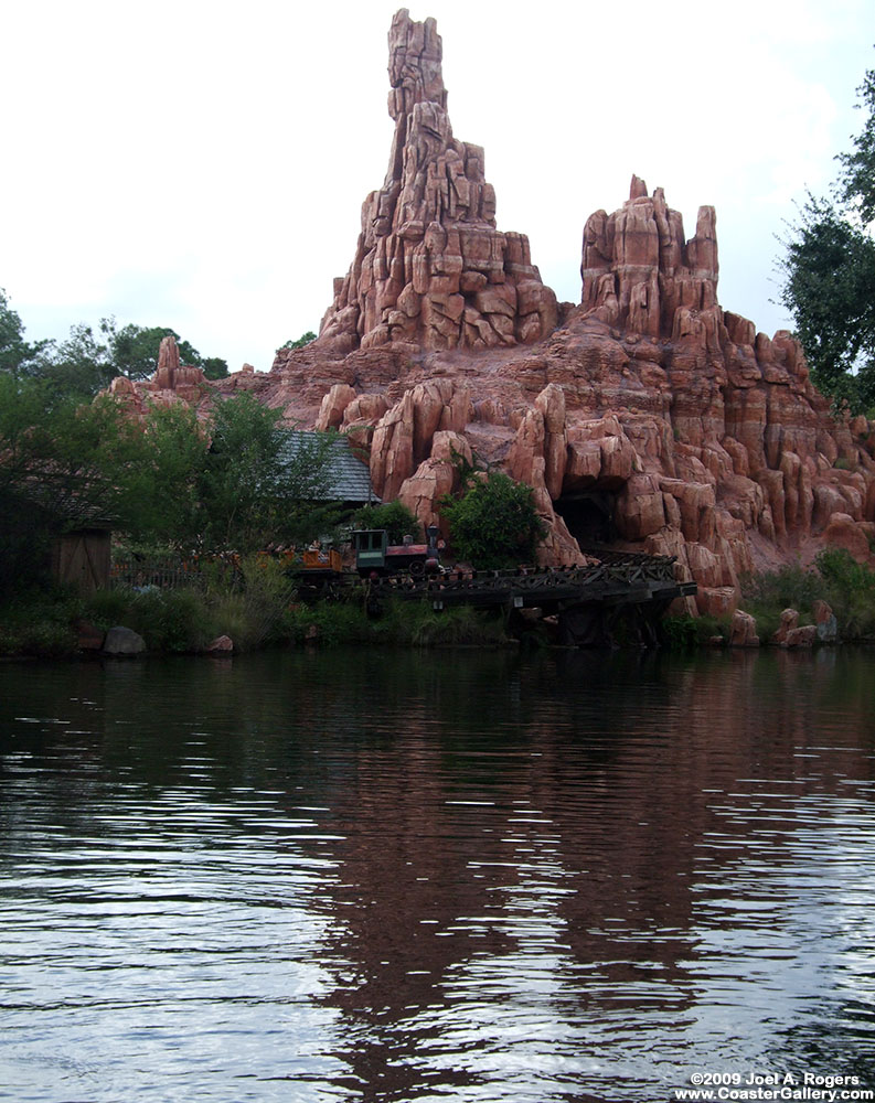 Imagineering - Big Thunder Mountain at Walt Disney World reflected in the water