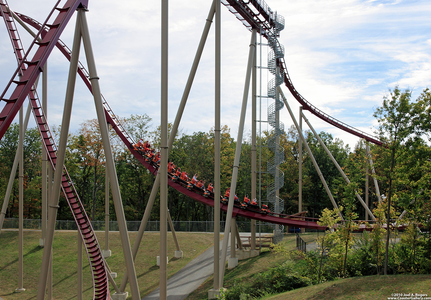 Stock image of a roller coaster in the woods