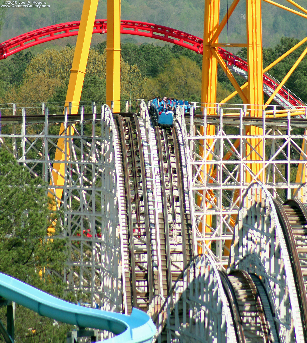 Rebel Yell and Intimidator 305 roller coasters. The wooded coaster was designed by John Allen and built by PTC.