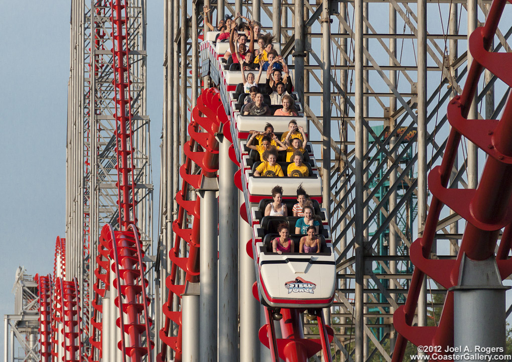 People having fun on a roller coaster