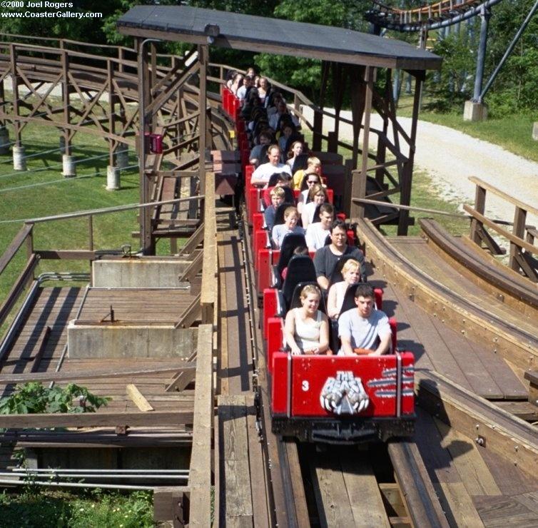 The Beast roller coaster with a PTC train