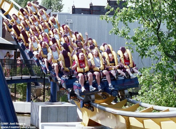 Floorless roller coaster train close-up