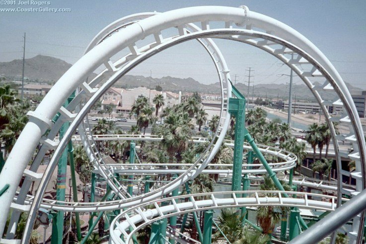 Tons of roller coaster track and palm trees - Castles and Coasters