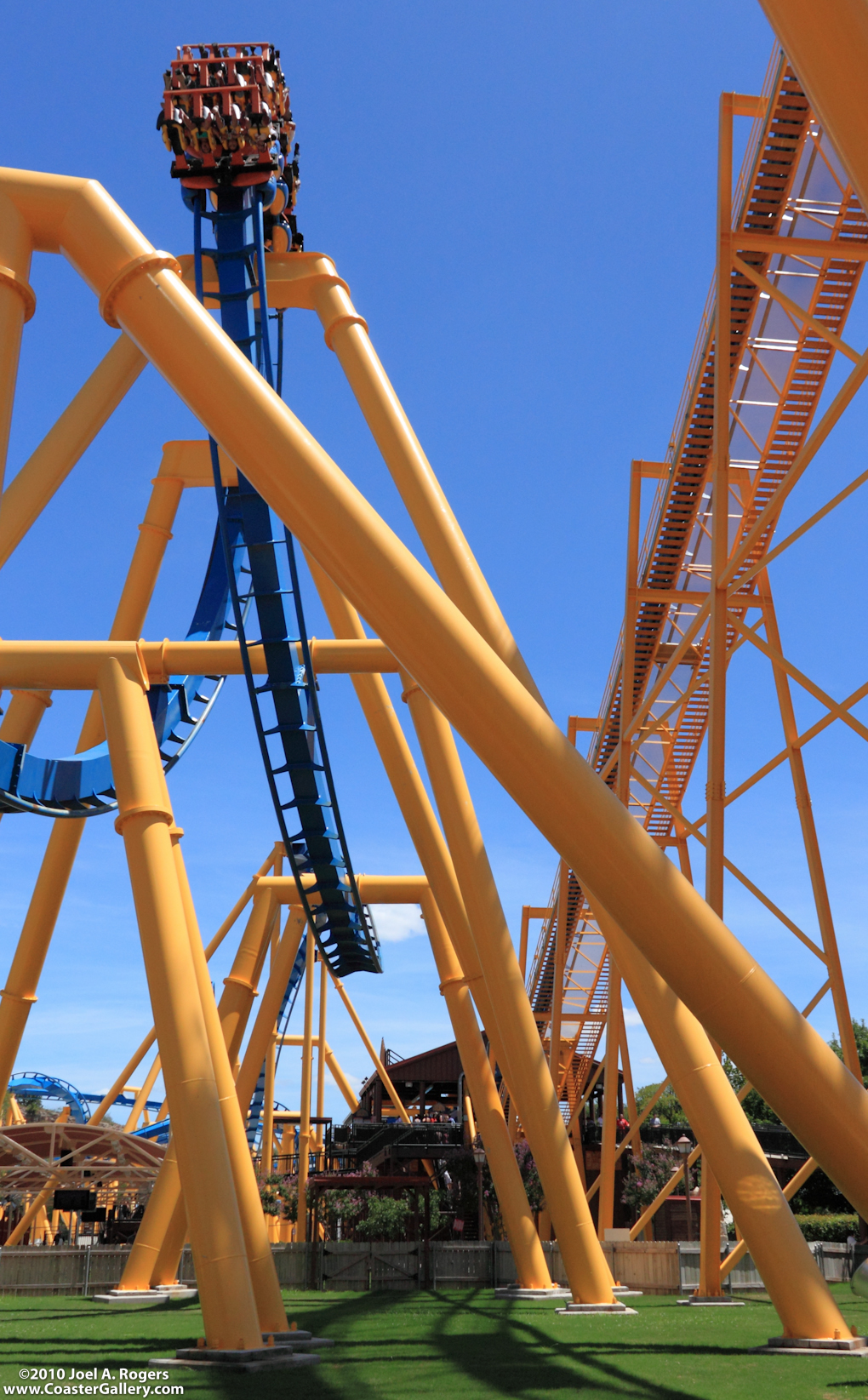 Stock image of a blue and yellow roller coaster