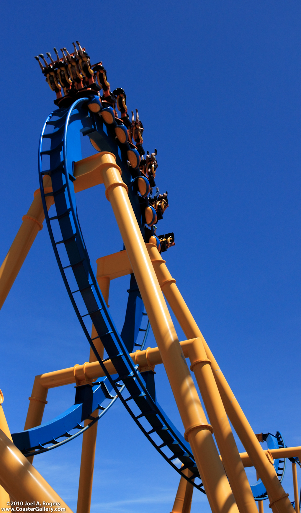 Vertical image of a modern steel roller coaster