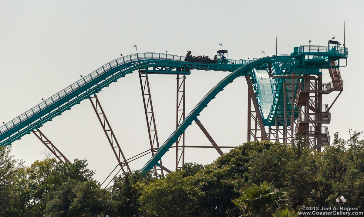 Ride op on Journey to Atlantis water coaster