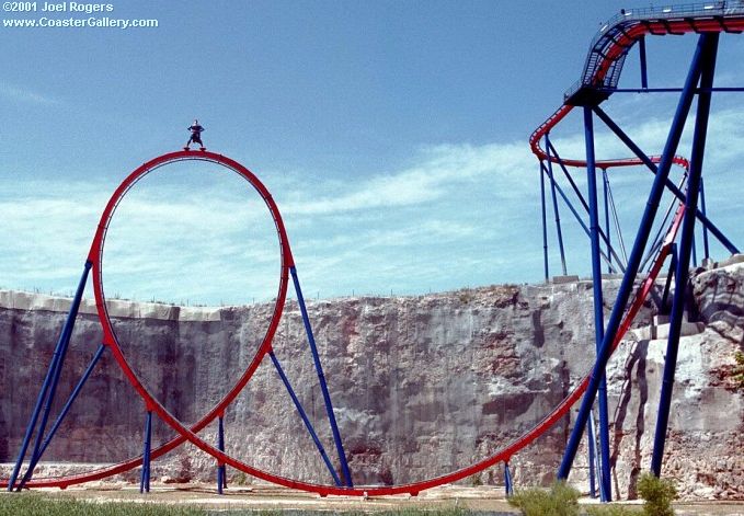 Superman standing on the world's tallest vertical loop