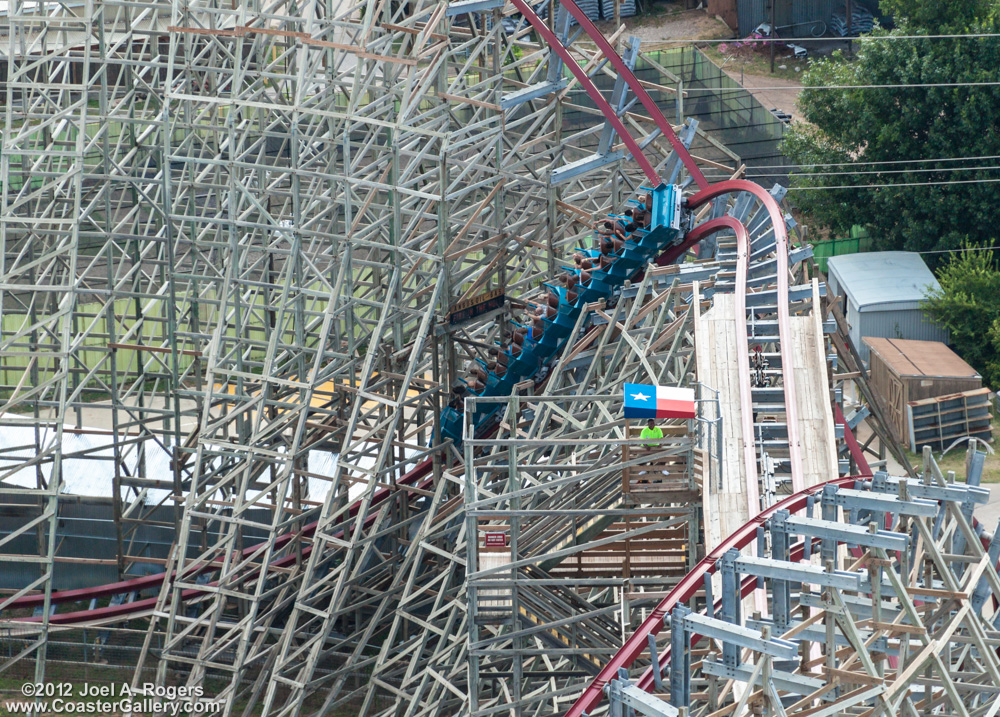 Mid-course brakes on a roller coaster