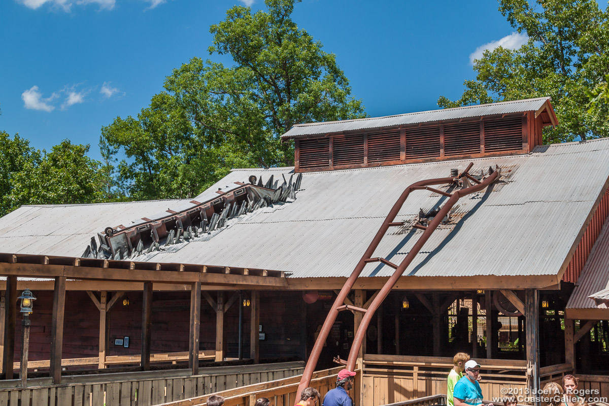 A roller coaster car after it crashed into a building