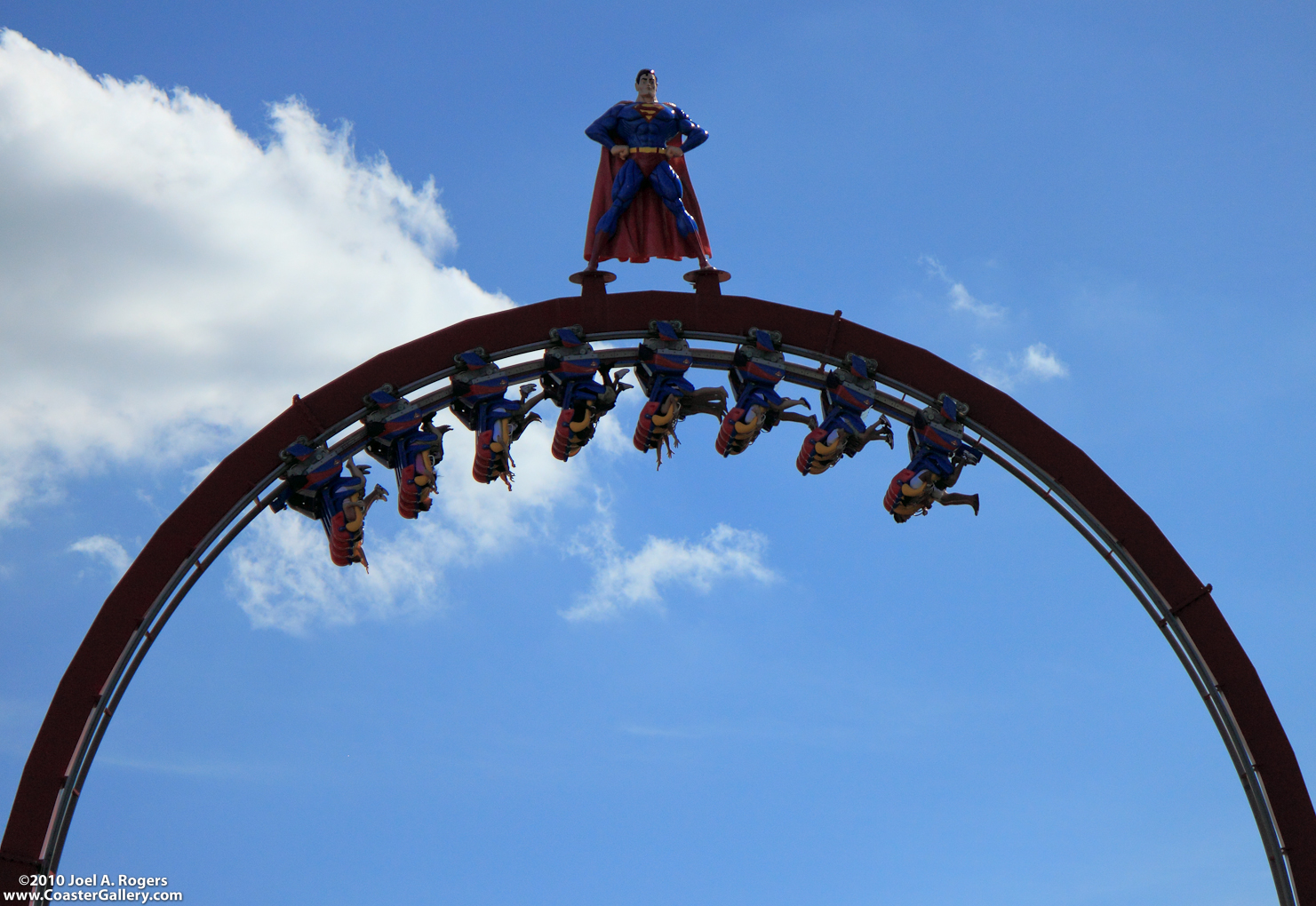A floorless roller coaster going upside-down.