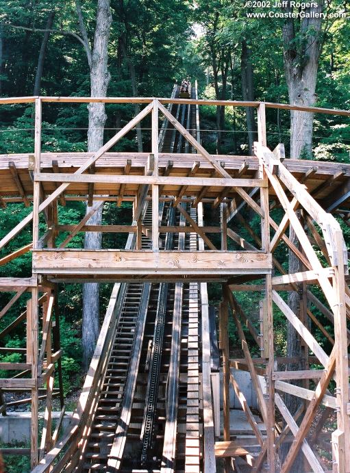Lift hill surrounded by trees