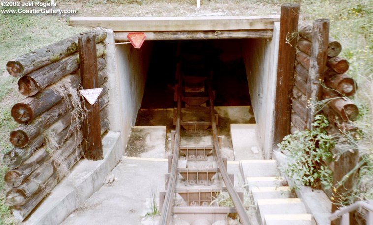 Roller coaster going into a tunnel