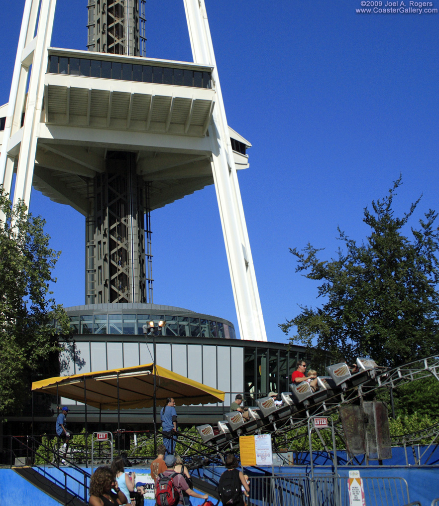 The Seattle Space Needle and a roller coaster at Fun Forest.