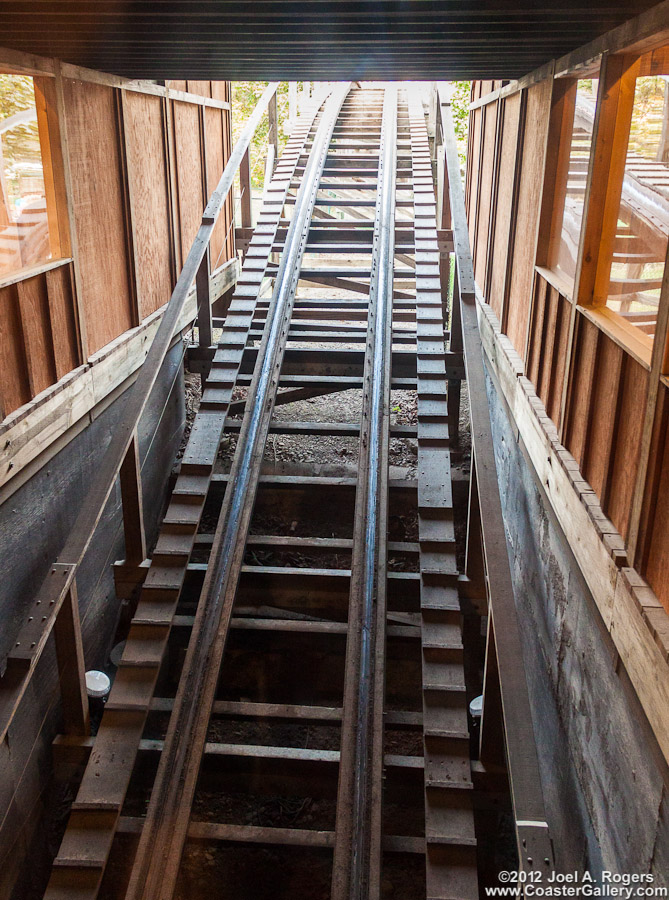 Roller coaster passing through the Shake, Rattle, and Roll gift shop!