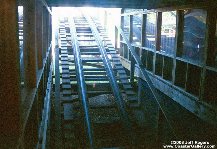 Roller coaster passing through the Shake, Rattle, and Roll gift shop!