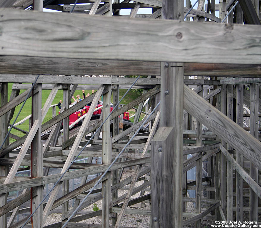 Lots of wood supporting a roller coaster