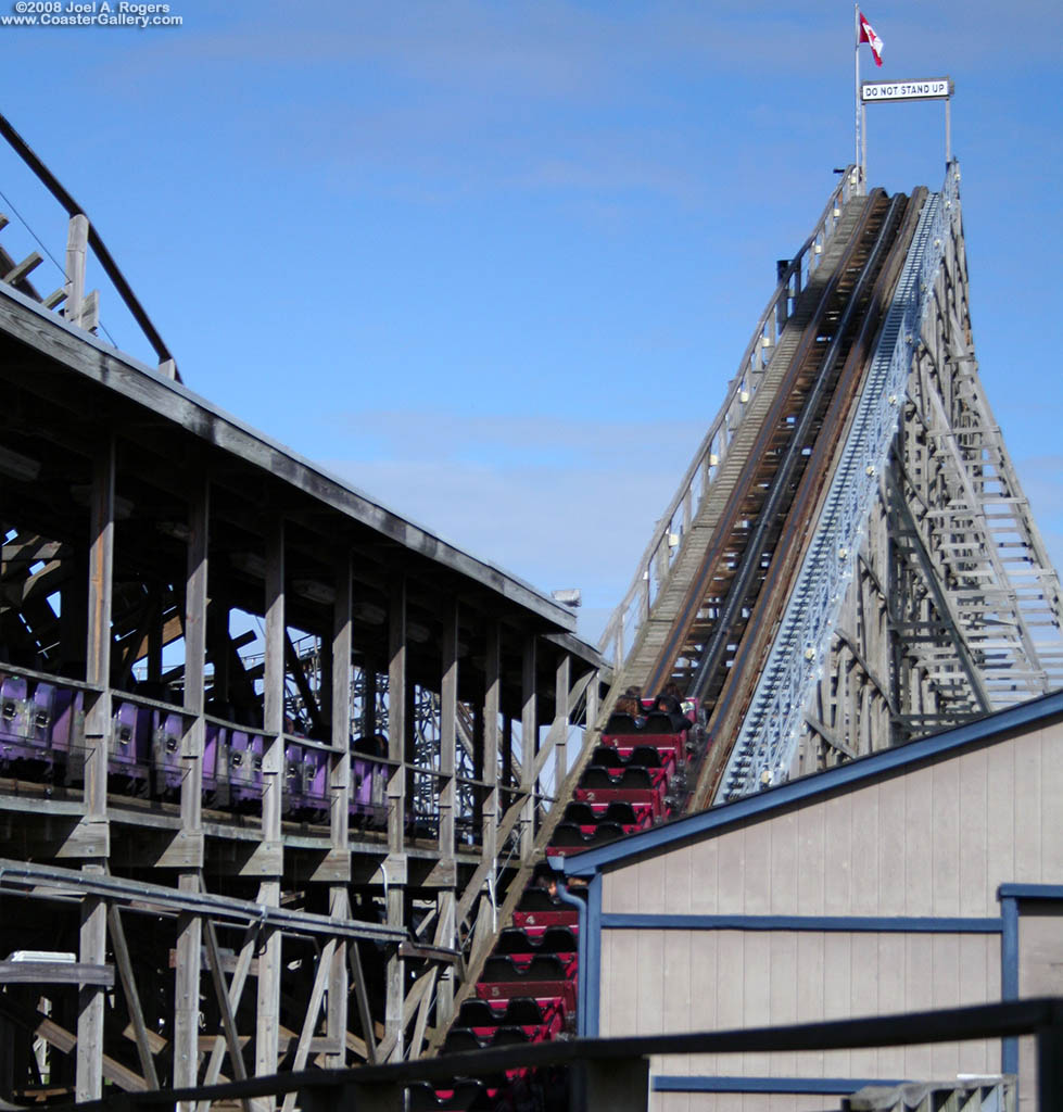 Two trains on the Wilde Beast wooden roller coaster