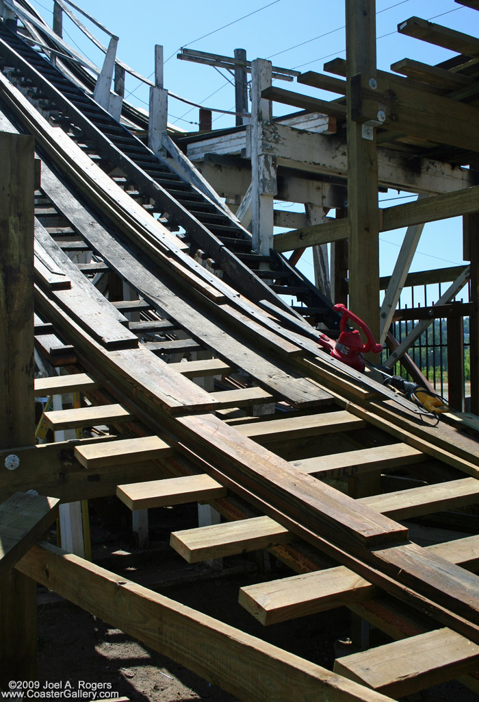 Buildup of wooden roller coaster track