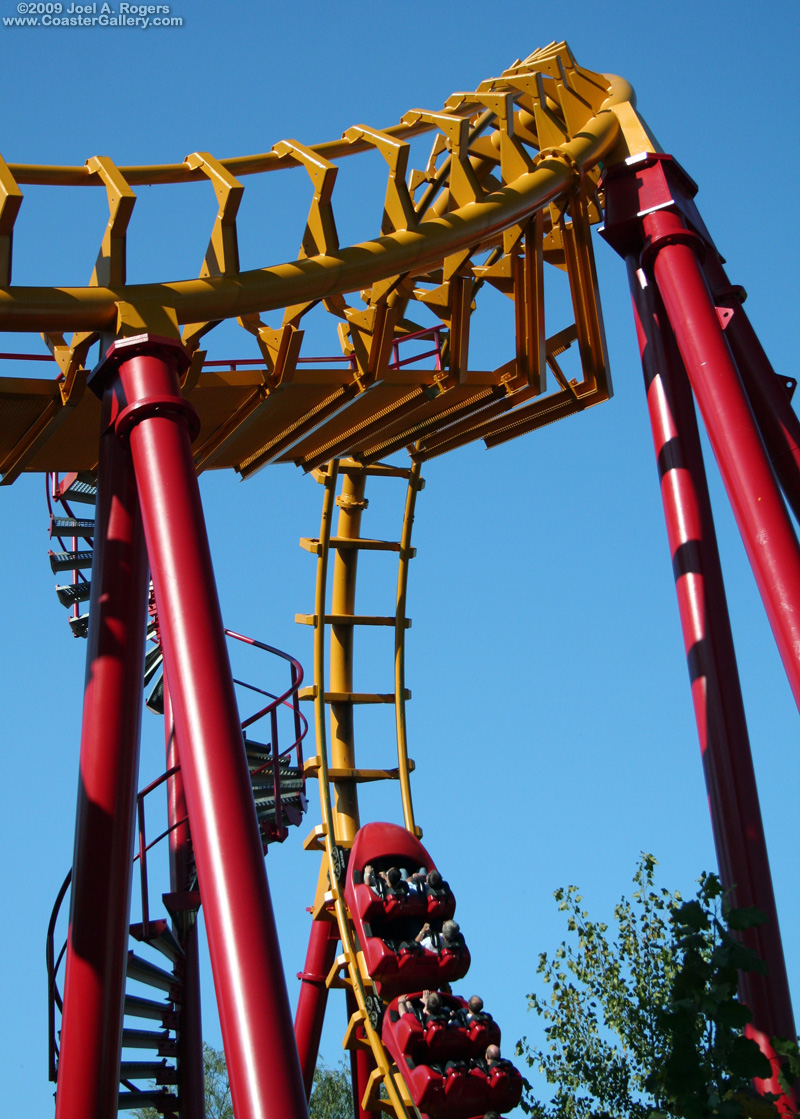 Red and yellow Vekoma Boomerang roller coaster
