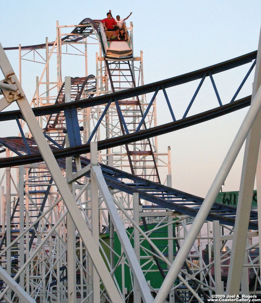 four-passenger cars on a thrill ride