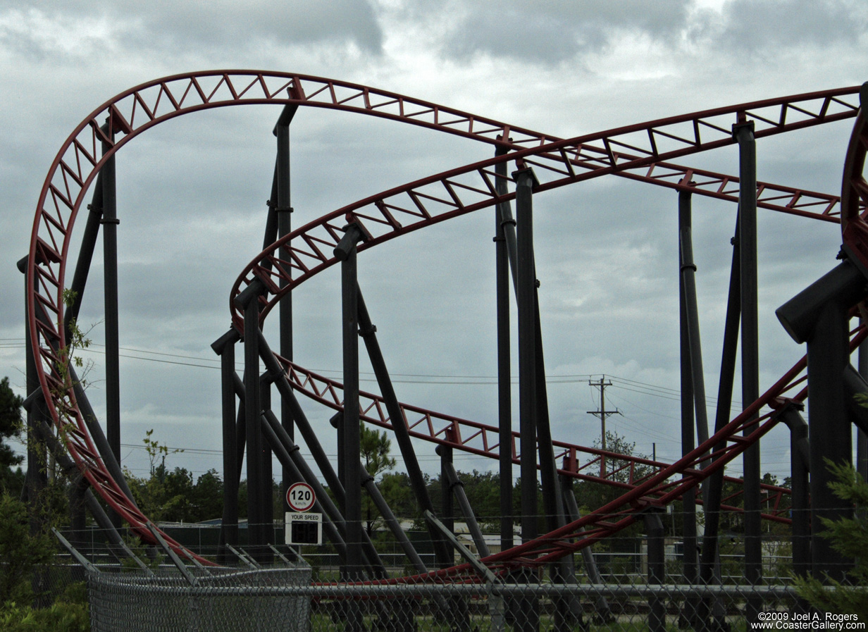 Roller coaster and a speed limit sign