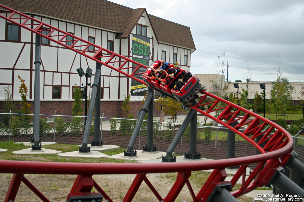 Roller coaster passing by the CSI:Live theater