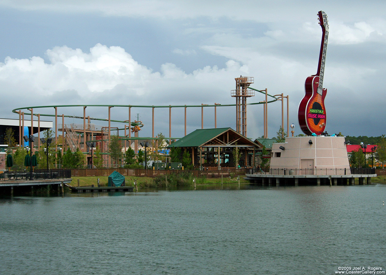 Unique music store selling guitars at an amusement park.