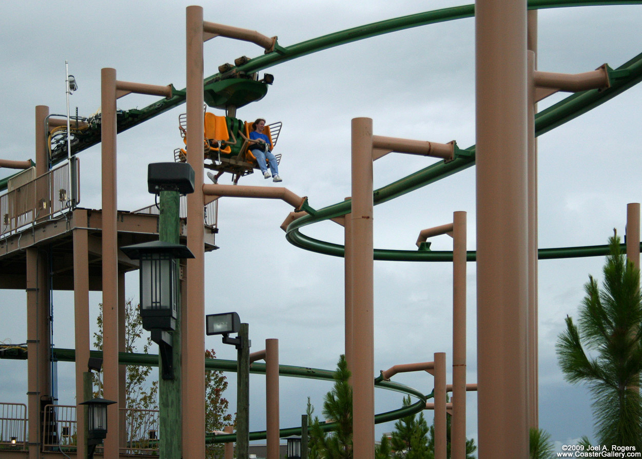 Four passenger trains on a suspended coaster