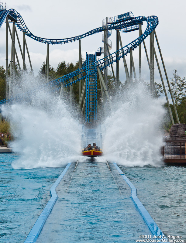 Water roller coaster splashing into the water
