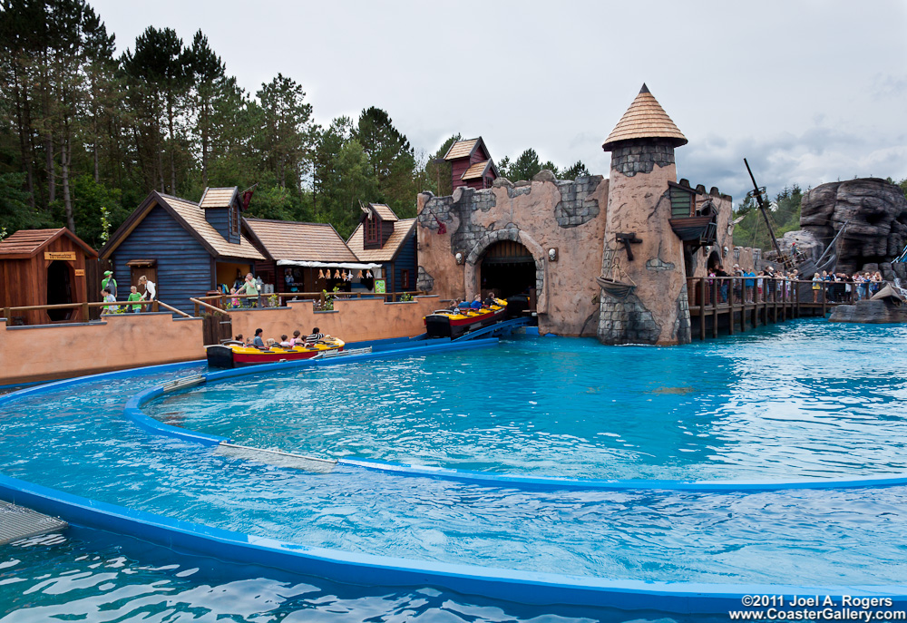 Boats floating downstream on a water ride in Denmark