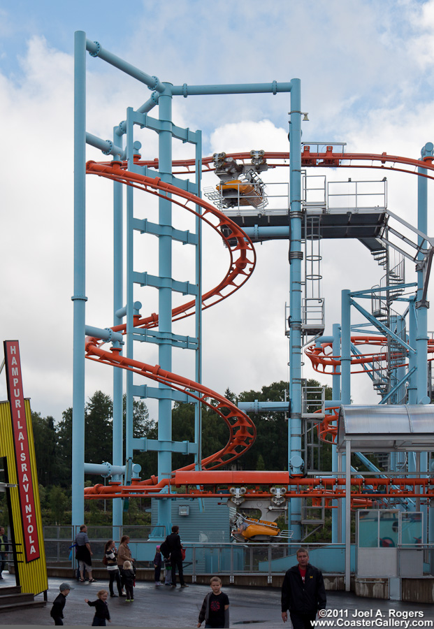 Spiral lift hill on a flying roller coaster