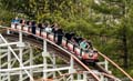 Buzz-bar restraints on a roller coaster