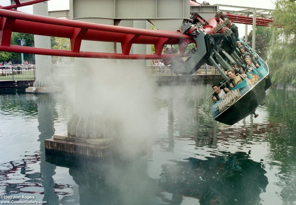 Iron Dragon zooming over the foggy Cedar Point Lagoon.