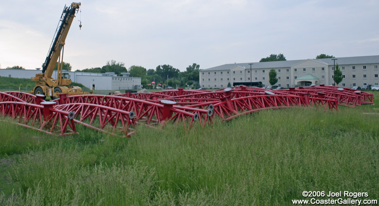 Intamin track piling up in a field in Ohio