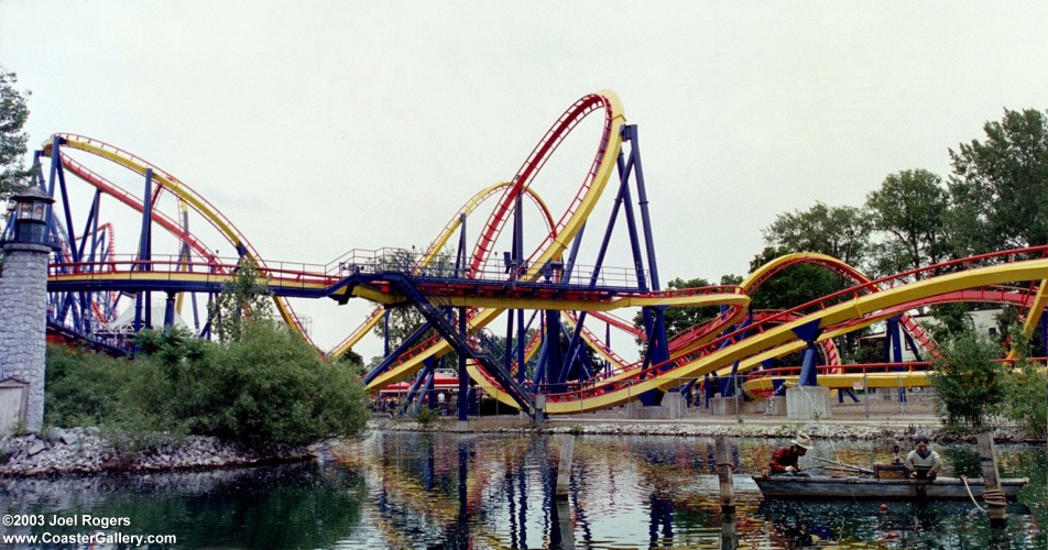 Mantis roller coaster reflected over the water