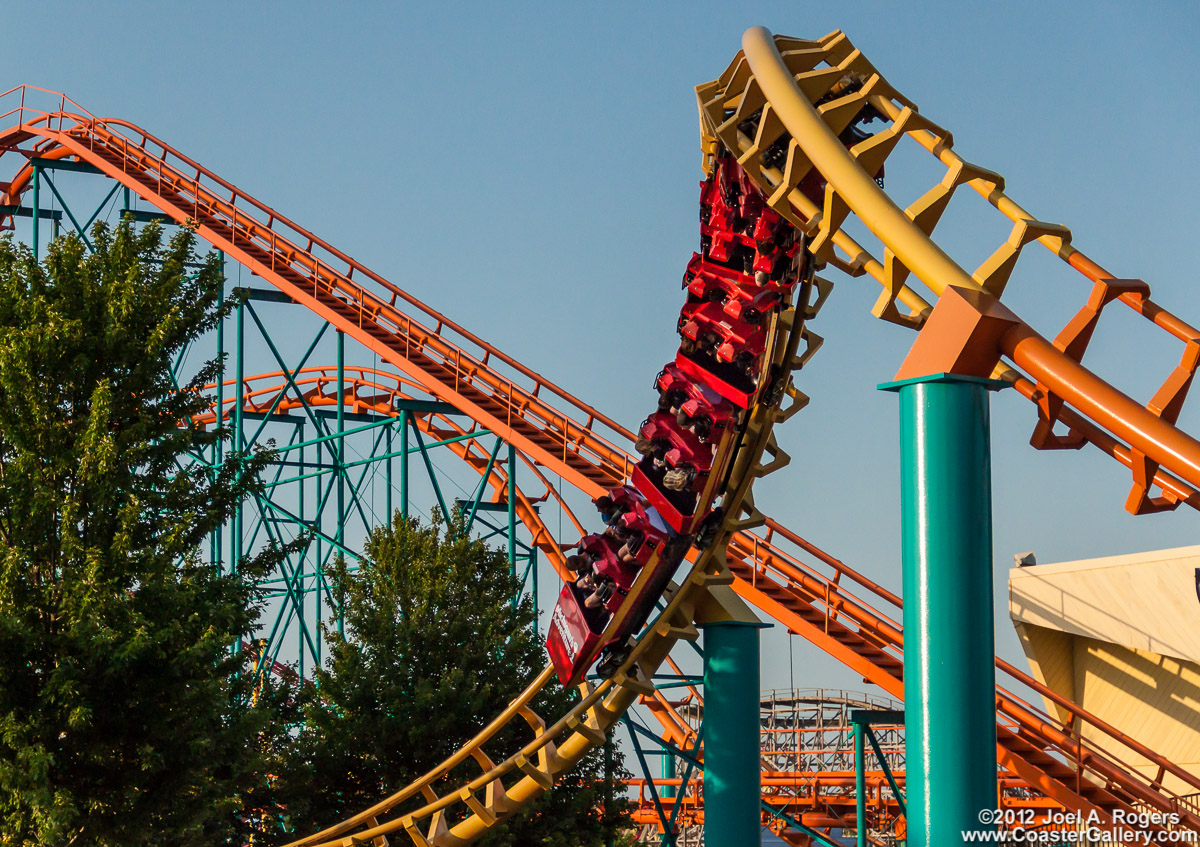 Corkscrew roller coaster going upside down through a loop