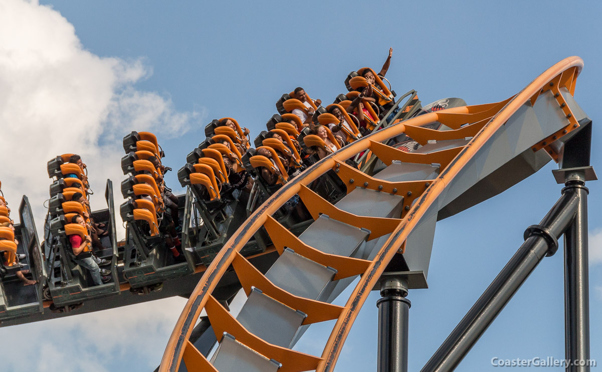 Trains on a stand-up roller coaster