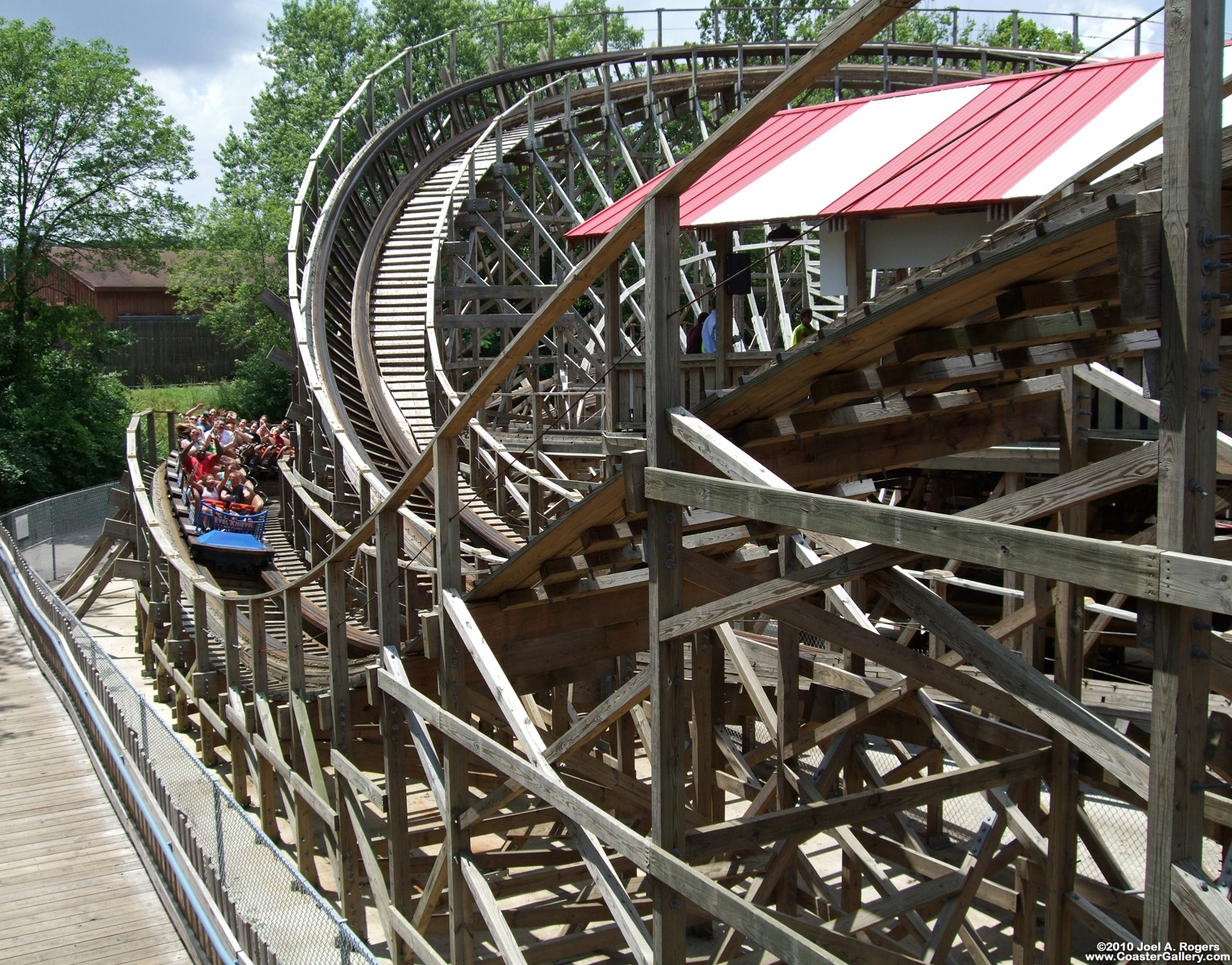 Roller coaster train and station