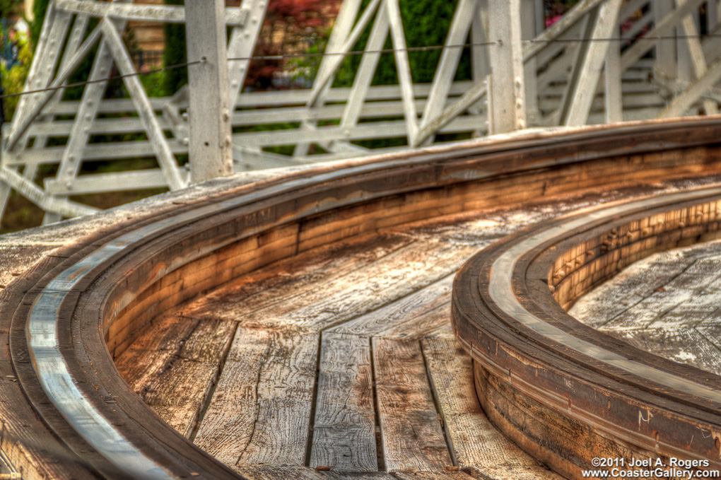 Peeling paint on an old wooden roller coaster