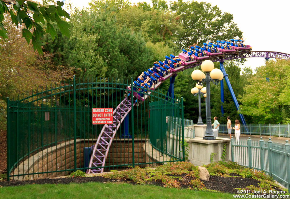 People watching a roller coaster