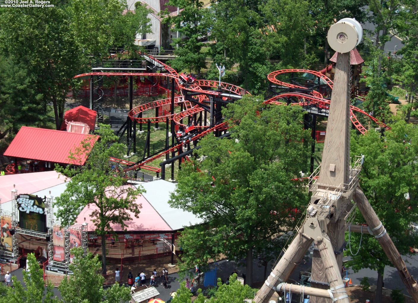 Aerial view of a roller coaster that spins. When Six Flags Over Mid-America opened in 1971, this part of the park was the Dolphin Arena. It later became the 
Sherwood Forest Theater.